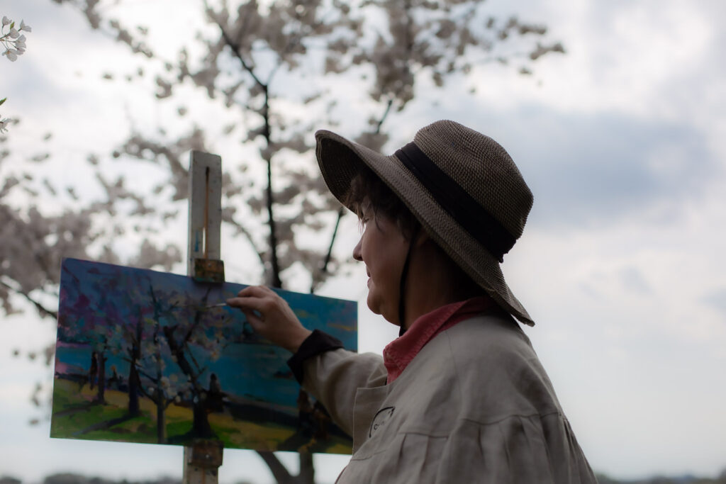 Woman plein air painting